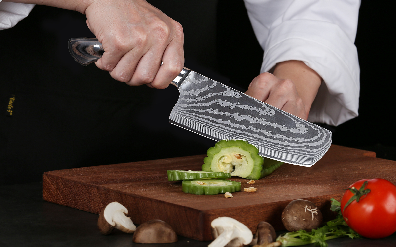 The Black Hawk-S 8.5-inch kiritsuke knife is designed to be elegantly modern and purposefully functional. Featuring special-forged high-carbon stainless steel with a high-tech vacuum heat-treatment and nitrogen cryogenic tempering, it ensures you the extreme strength, flexibility, durability, and maximum performance.