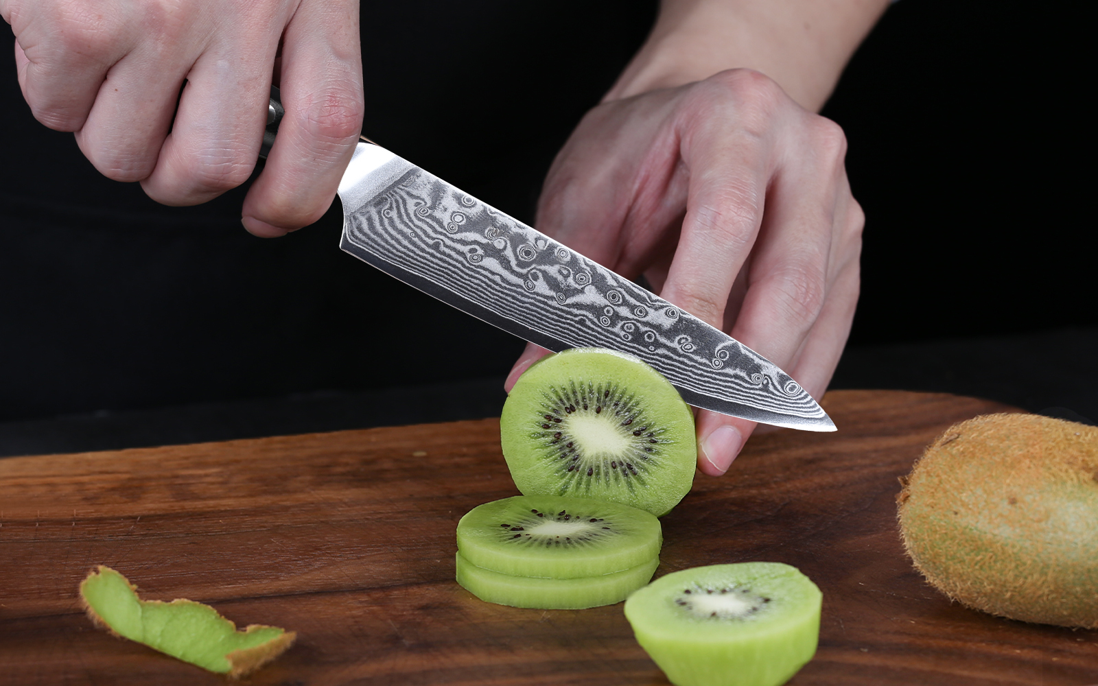 The knife is designed with an ergonomic, wood-effect handle that sits comfortably within the hand and is coated with a Micarta resin that provides a secure grip when wet or dry - reducing the risk of injury.