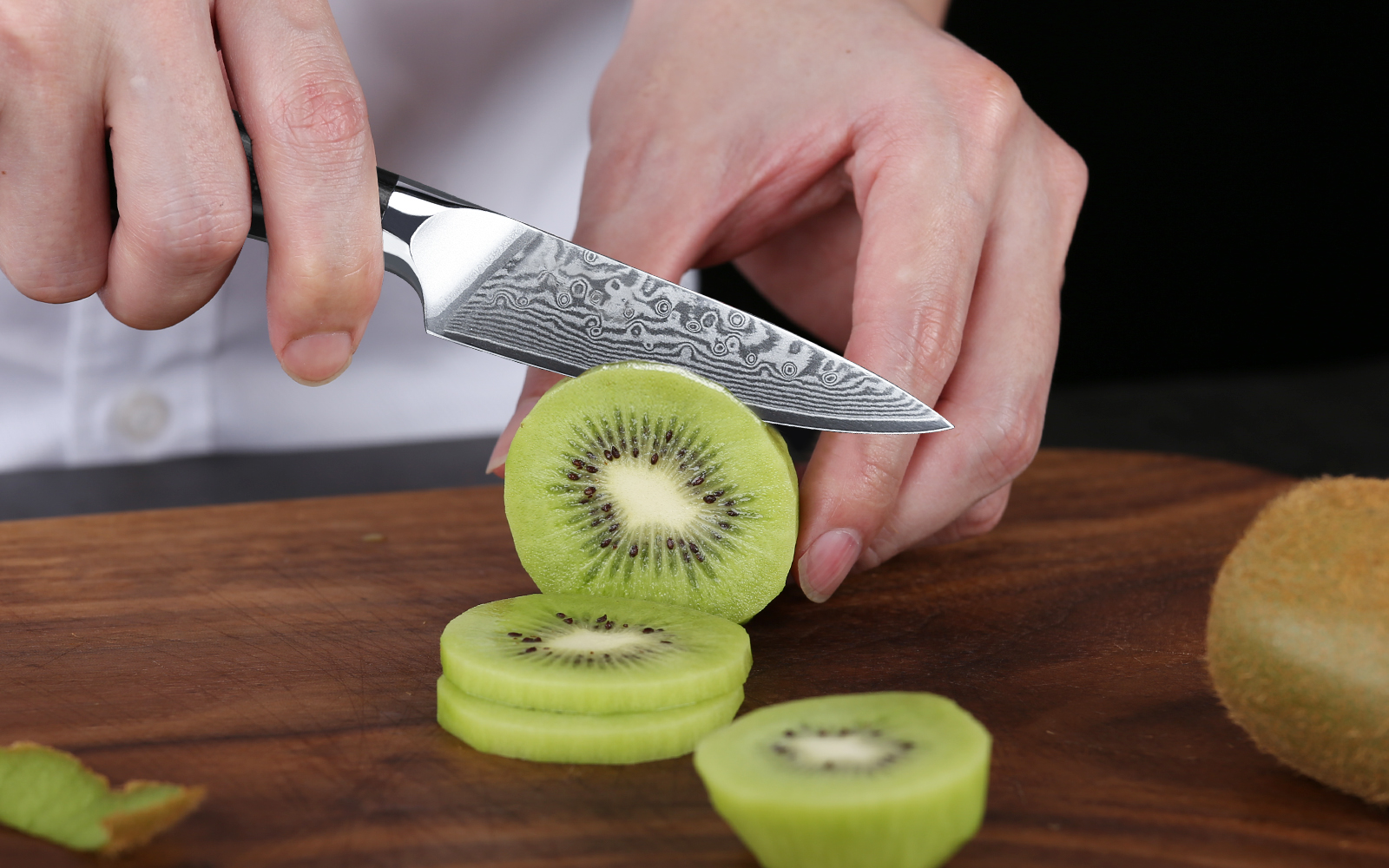 The Black Hawk Paring Knife with a small blade which tapers to the point, is designed to be a combination of simple beauty and practical functionality. Featuring special-forged high-carbon stainless steel with a precise vacuum heat-treatment and nitrogen cryogenic tempering, it ensures you the superb hardness, flexibility, and lasting performance.