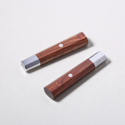 Japanese wa handle made of rosewood and stainless steel, designed for strength and comfort