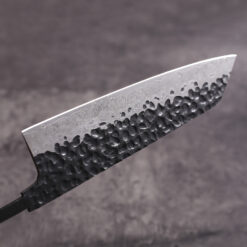 Small kiritsuke blade blank with hammered upper and Damascus wave lower finish