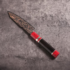 japanese damascus prep knife with copper highlights and turquoise handle accent