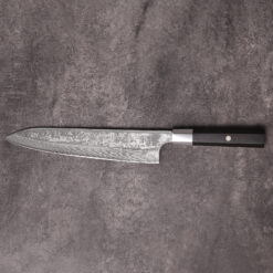 Handcrafted 240mm gyuto blade with traditional black wa handle